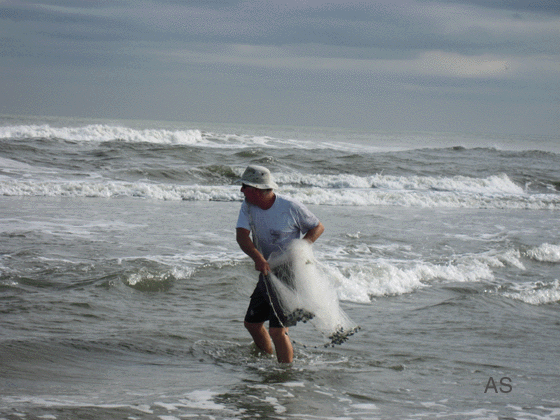 Captain Dave Showell Throwing a Cast Net 